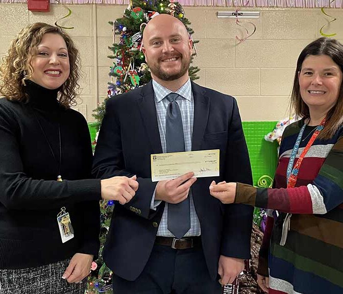 From left: Mable Woolsey Elementary School Principal Jodi Keever, Knoxville Community Fund Advisory Board Chair Chris Hroziencik, and Mable Woolsey Elementary School Special Education Teacher Sarah Hilman.