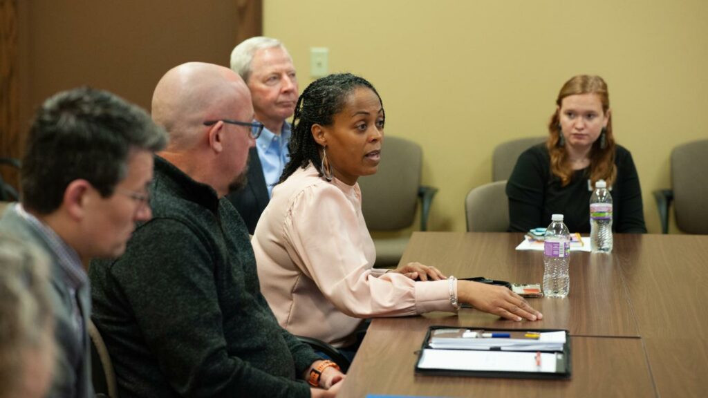 Knox County Housing Authority Participant Engagement Manager Kim Sibley talks with the group at a presentation of the Hunger Collaborative.