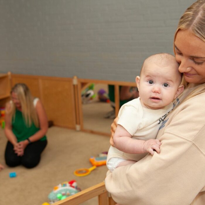 Caregivers and the infants and toddlers they care for at Roseville Kids Place.